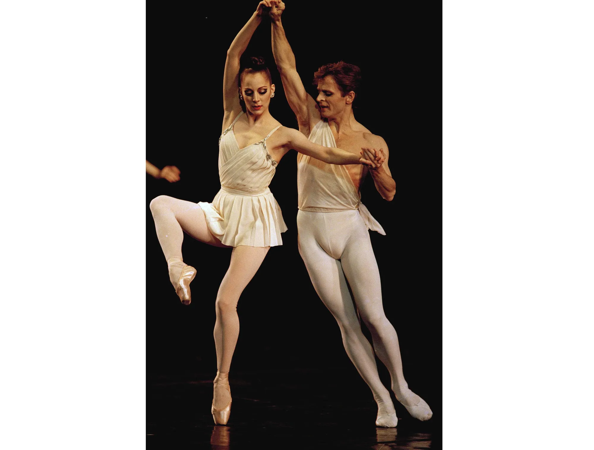 Dancer Mikhail Baryshnikov, right, performs with Susan Jaffe during a gala performance in honor of the great Soviet ballerina Maya Plisetskaya, at the Wang Center in Boston on March 28, 1988. American Ballet Theatre has named Jaffe its new artistic director  (AP Photo/Elise Amendola, File)
