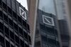 The Deutsche Bank AG logo sits on the German lenders office building in Frankfurt, Germany,.