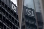 The Deutsche Bank AG logo sits on the German lenders office building in Frankfurt, Germany,.