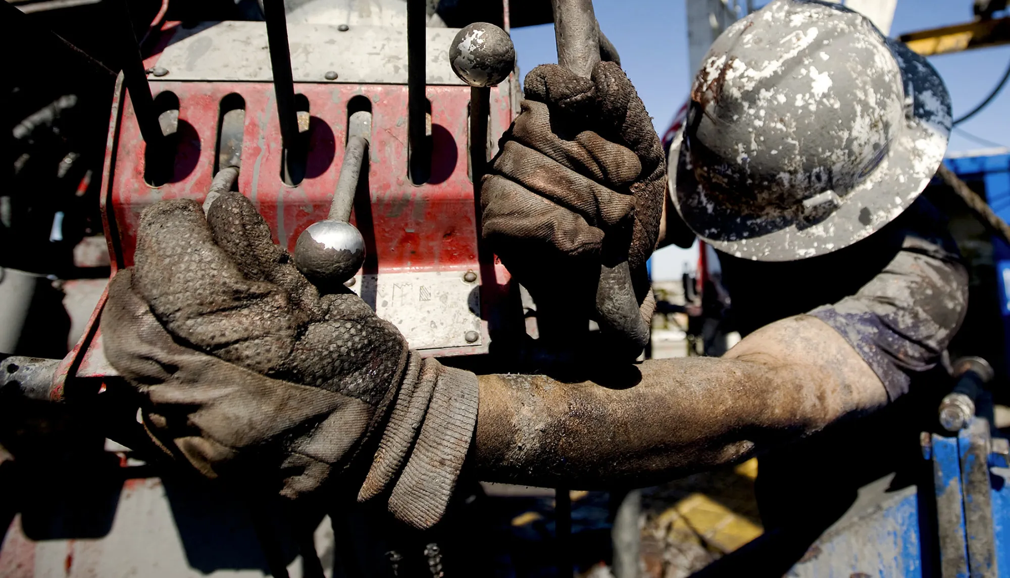A floorman works on a Chesapeake Energy natural gas rig in the North Texas Barnett Shale bed rock deposit, in Kennedale, Texas.
