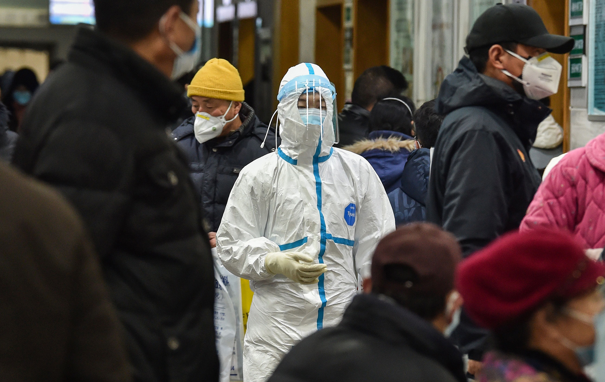 A medical staff member wearing protective clothing walks at the Wuhan Red Cross Hospital in Wuhan on Jan.&nbsp;24, 2020.