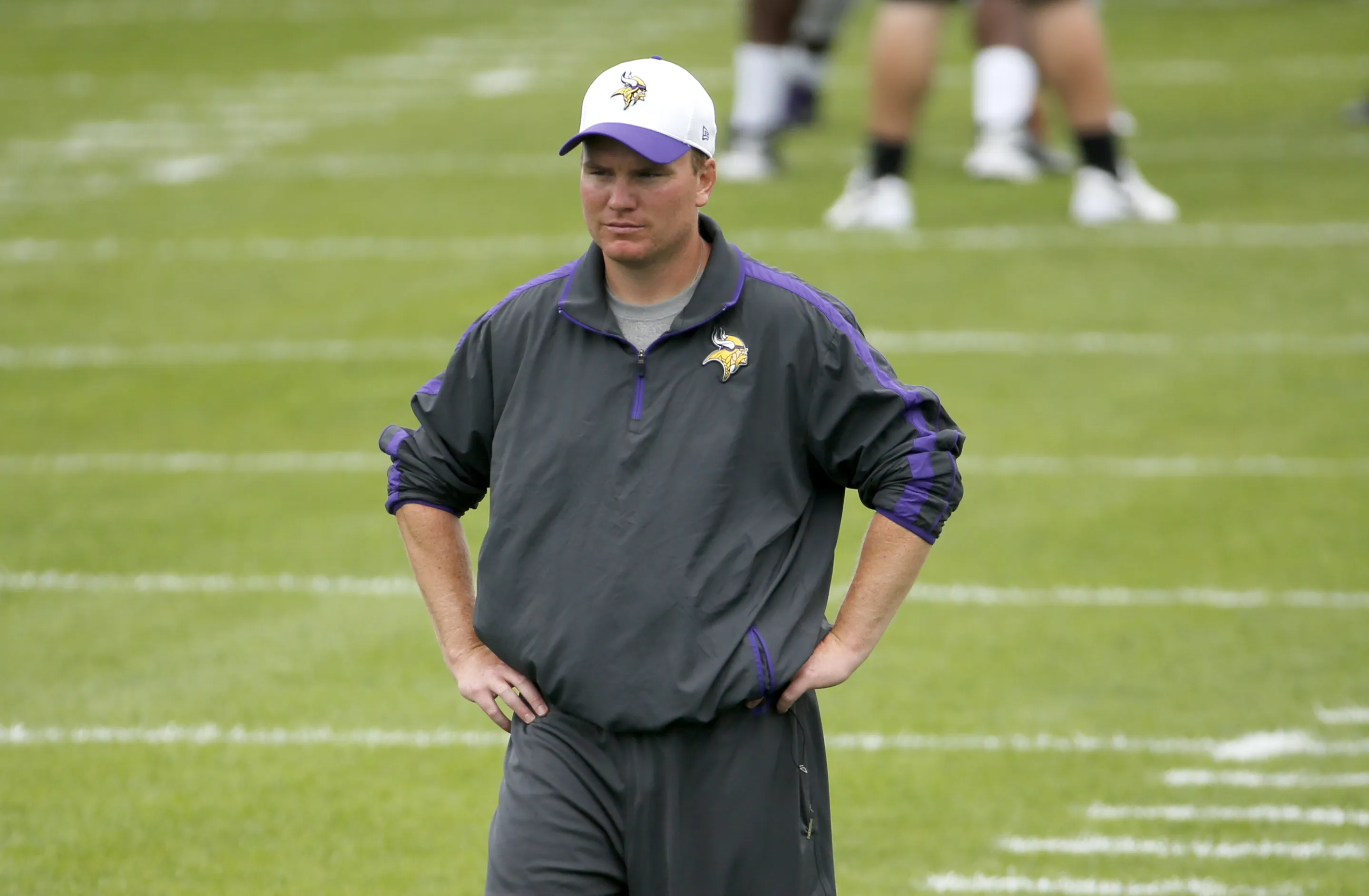 Minnesota Vikings defensive backs coach Adam Zimmer watches practice at an NFL football training camp on the campus of Minnesota State University, Tuesday, July 28, 2015, in Mankato, Minn. The death of Adam Zimmer, a former Minnesota Vikings co-defensive coordinator and the son of former head coach Mike Zimmer, was caused by chronic alcohol use, according to medical examiners.The Hennepin County Medical Examiner’s Office in Minnesota released the finding Friday, Dec. 16, 2022. Zimmer had been found dead in his home in Mendota Heights, a Twin Cities suburb, on Oct. 31. He was 38. (AP Photo/Charles Rex Arbogast, File)