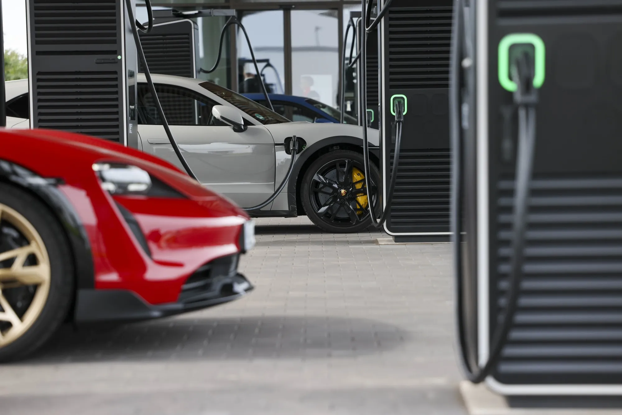 A Porsche EV charges its batteries at a&nbsp;Porsche&nbsp;charging lounge in Bingen, Germany in 2023.