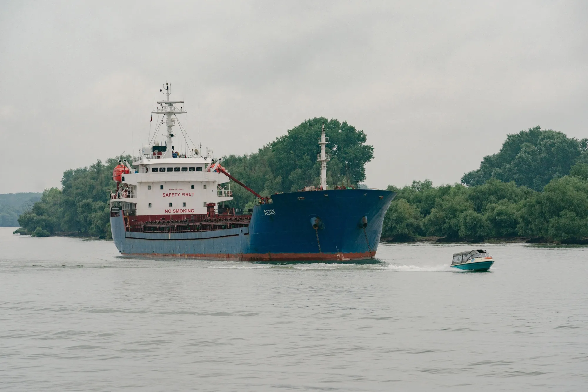 A cargo ship navigates the Sulina Canal in Tulcea, Romania, on July 23.