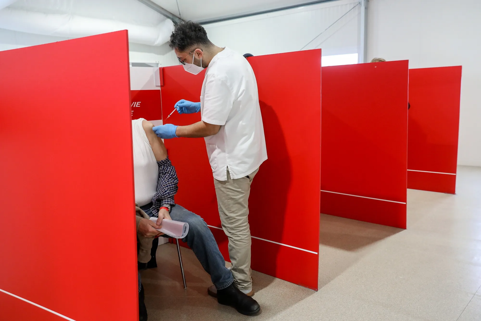 A health worker administers the Covid-19 vaccine at a center outside&nbsp;Termini railway station in Rome.