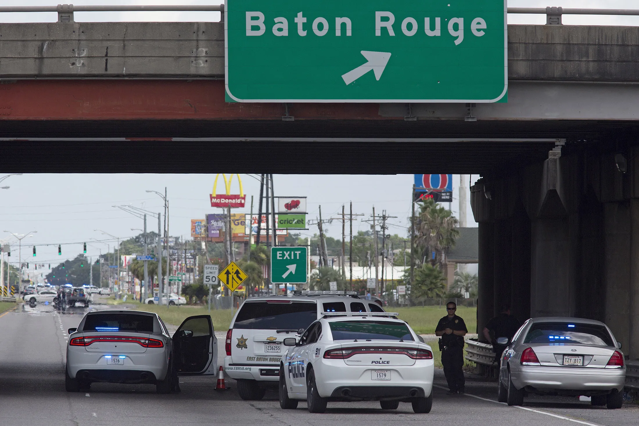 Baton Rouge Police block Airline Highway after police were shot in Baton Rouge, Louisiana on Sunday.
