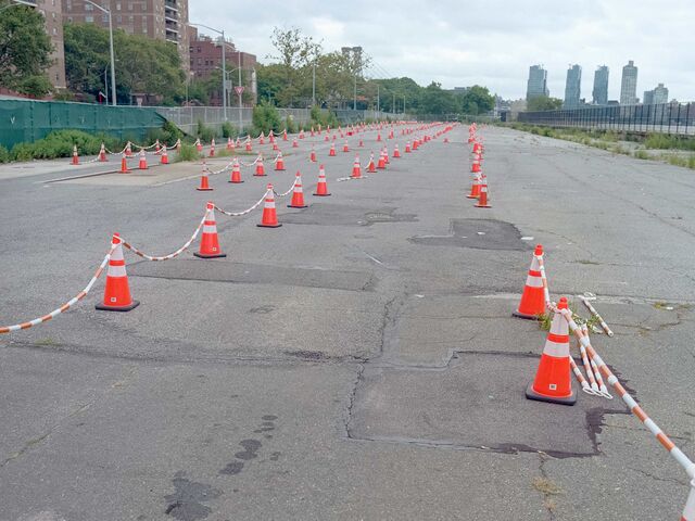 After the morning rush, this extra parking lot near the East River is no longer necessary and sits empty.