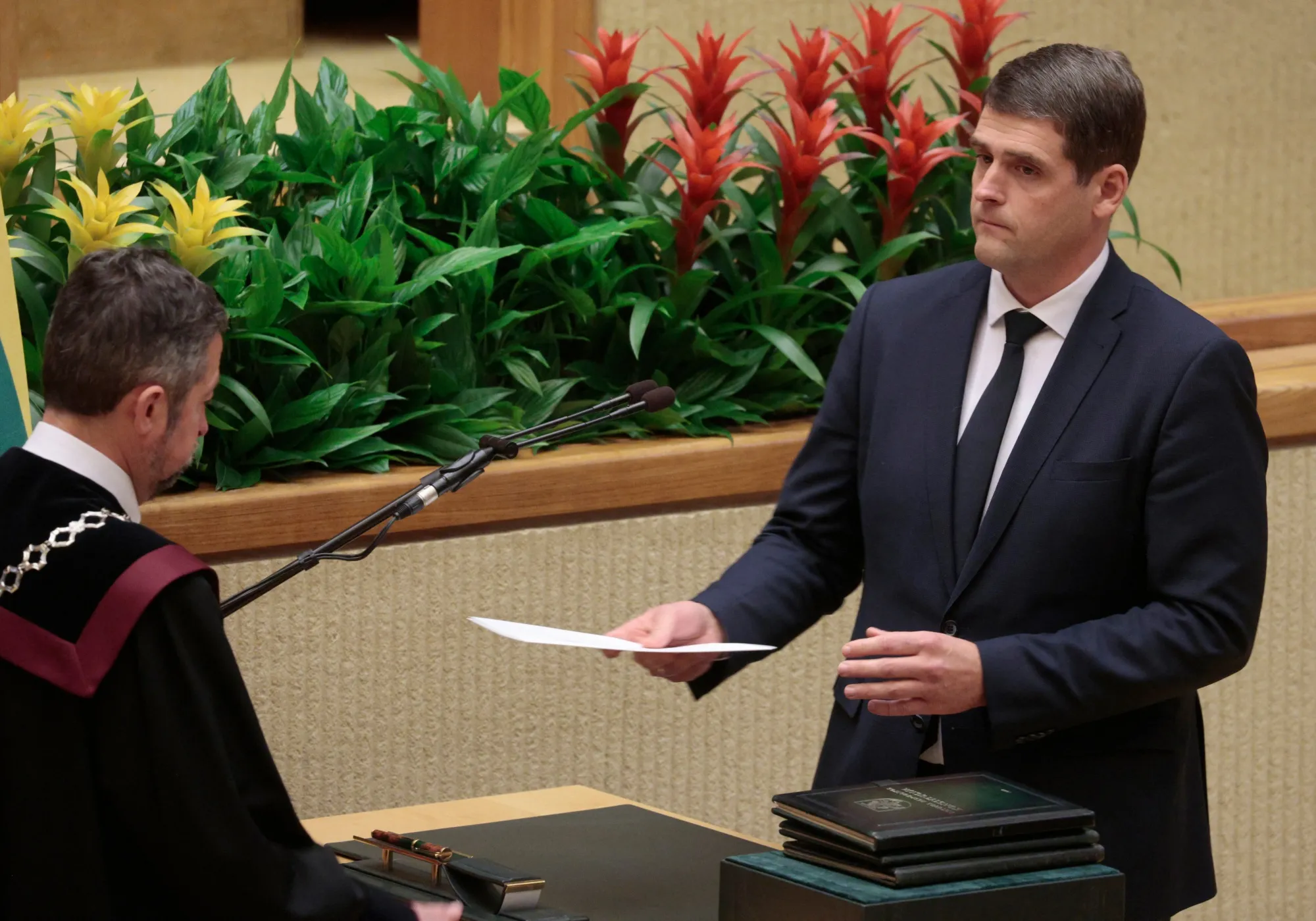 Remigijus Zemaitaitis during a ceremony to swear in MPs of the new government at Lithuania’s parliament in Vilnius, on Nov. 14.