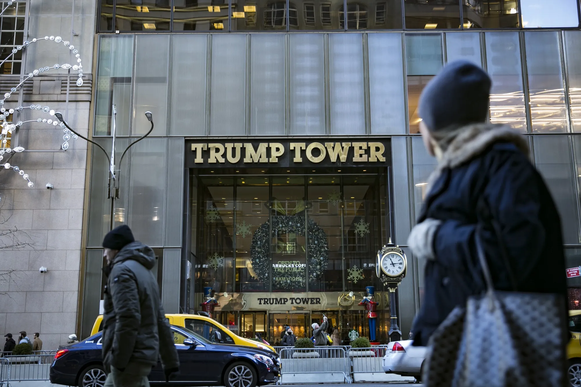 Pedestrians pass in front of Trump Tower in New York.&nbsp;