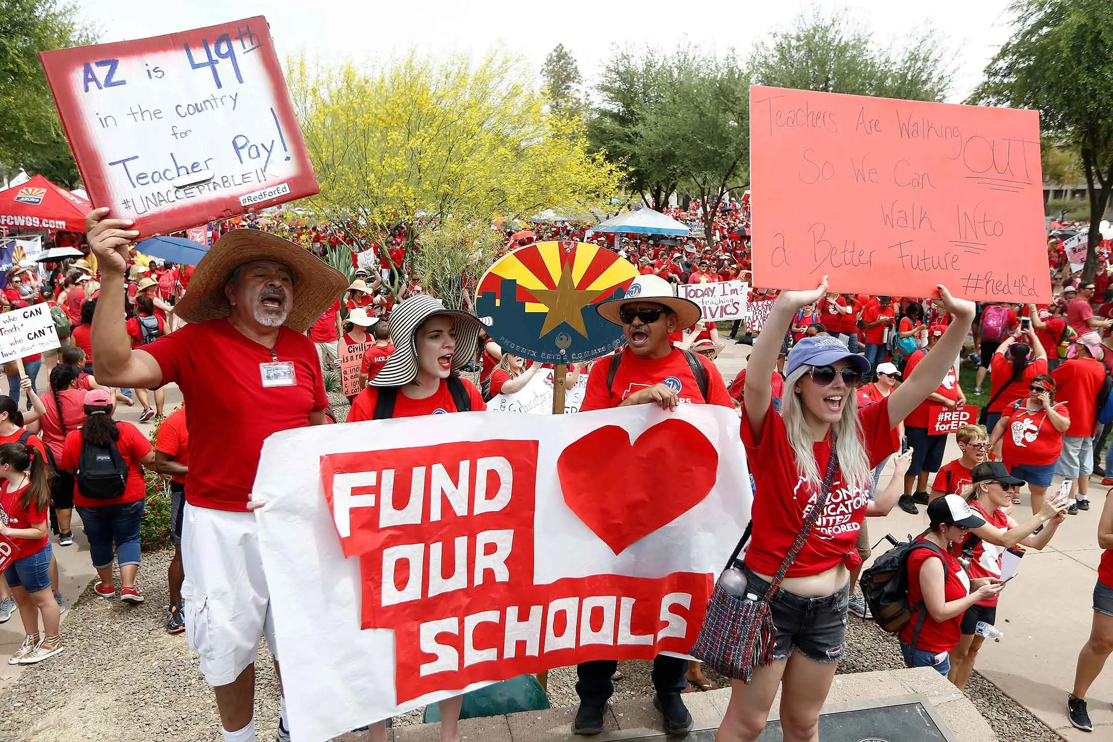 Demonstrators chant in a protest at the Arizona Capitol for higher teacher pay and school funding on the first day of a statewide teachers&nbsp;strike on April 26, 2018, in Phoenix.
