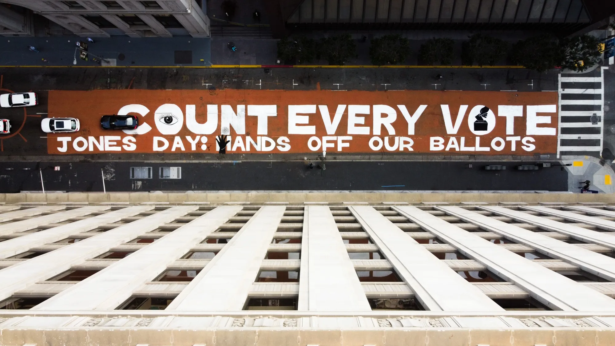 A mural along Montgomery Street reads "Count Every Vote" and "Jones Day: Hands Off Our Ballots" in San Francisco, on Nov. 6.