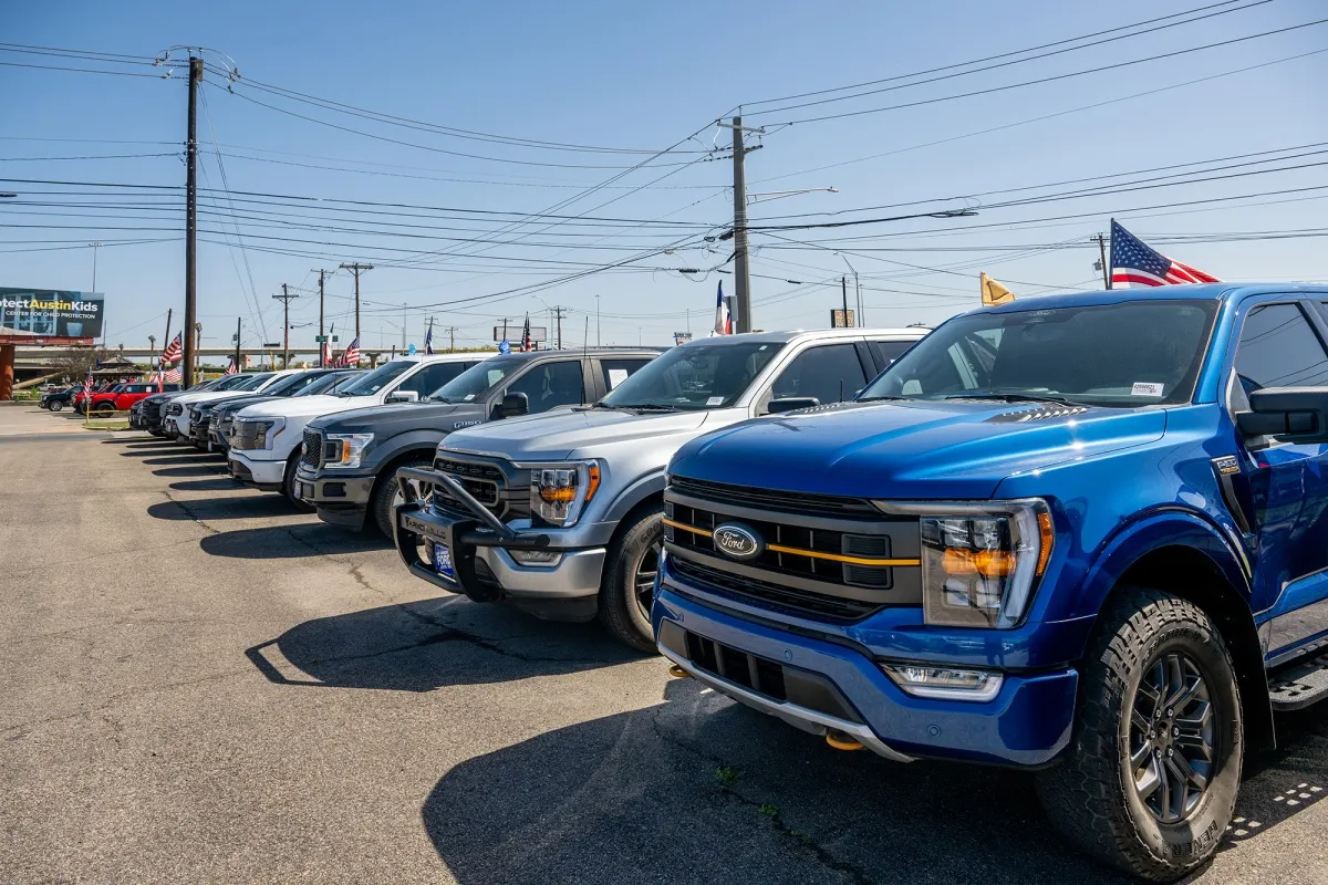 Ford-150 pickup trucks for sale at a dealership in Austin, Texas