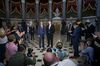 Mark Meadows, right, listens as Steven Mnuchin speaks to members of the media following a meeting at the U.S. Capitol in Washington, D.C. on Aug. 7.