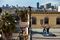 Kat Shreve, a former resident, leads a weekly yoga session on the roof