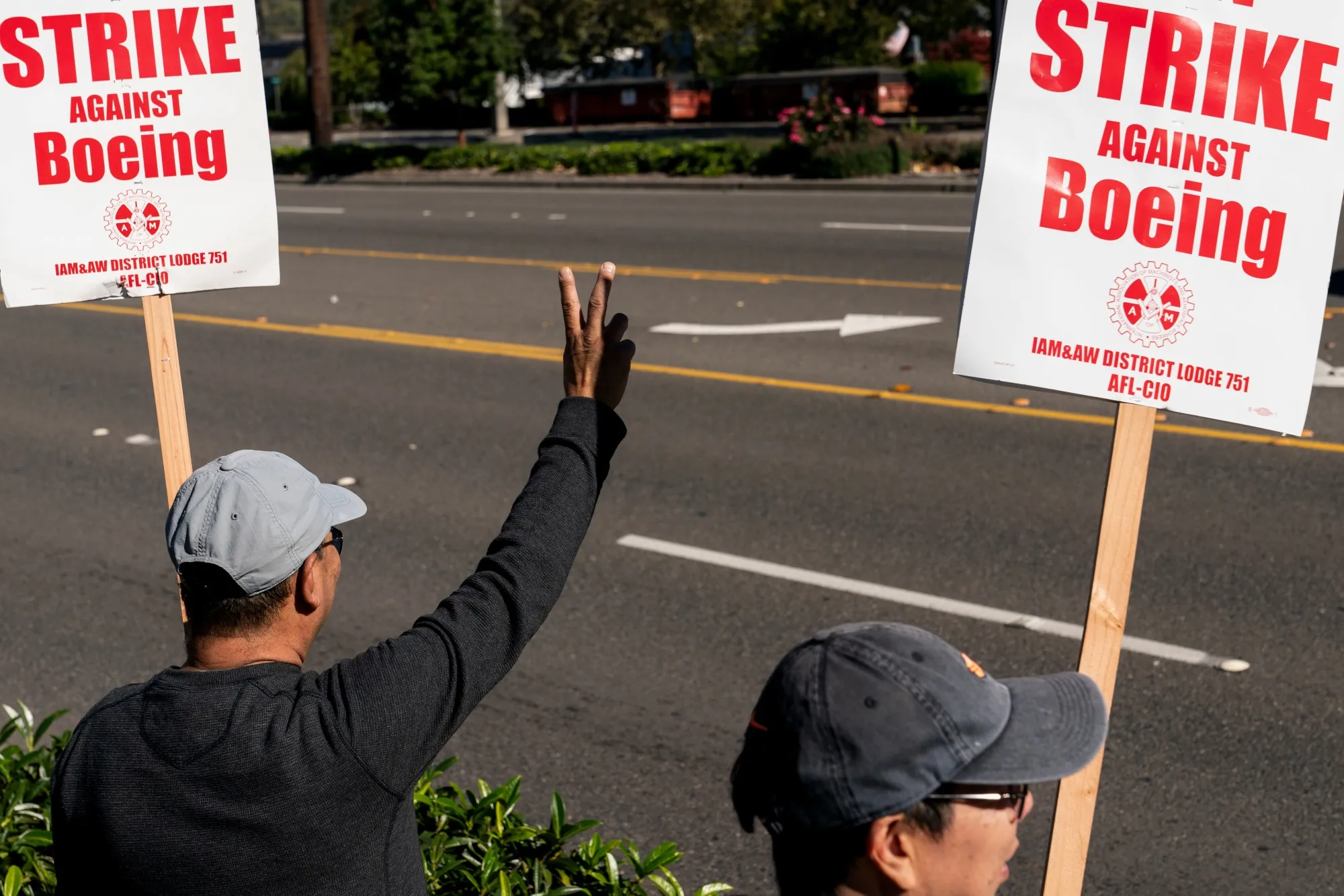 Workers picket outside the Boeing Co. manufacturing facility&nbsp;in Renton.&nbsp;