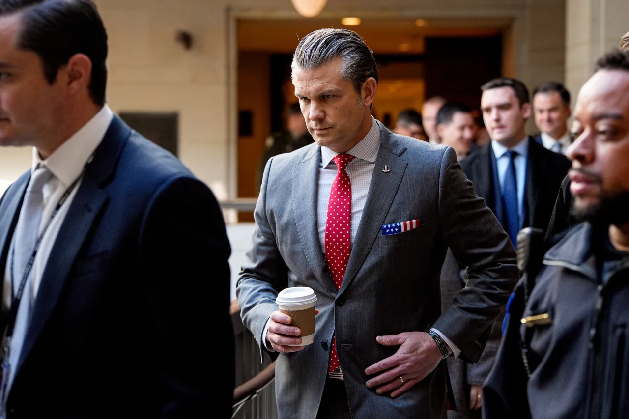 Secretary of War Pete Hegseth moves from the Senate to the House as he attends closed door meetings with lawmakers on Capitol Hill in Washington on Dec. 16.