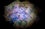 Mixed denomination Russian ruble banknotes.