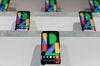 Pixel 4 smartphones are displayed during the Made by Google event in New York, U.S., on Tuesday, Oct. 15, 2019. Google is going back to basics for its latest laptop: a standard clam-shell design that moves away from the previous foldable, tablet-style Pixelbook.