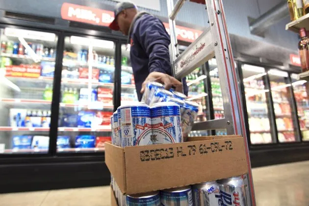 Beer stocked in the coolers at a Family Dollar Store in Mansfield, Texas