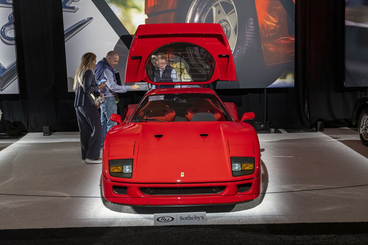 Should You Invest in a Ferrari or Gold?