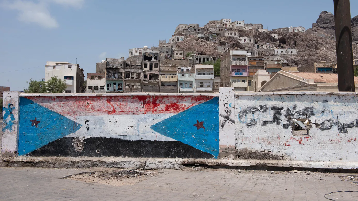 Southern separatist flag painted on wall in Aden, Yemen. Photographer: Glen Carey/Bloomberg
