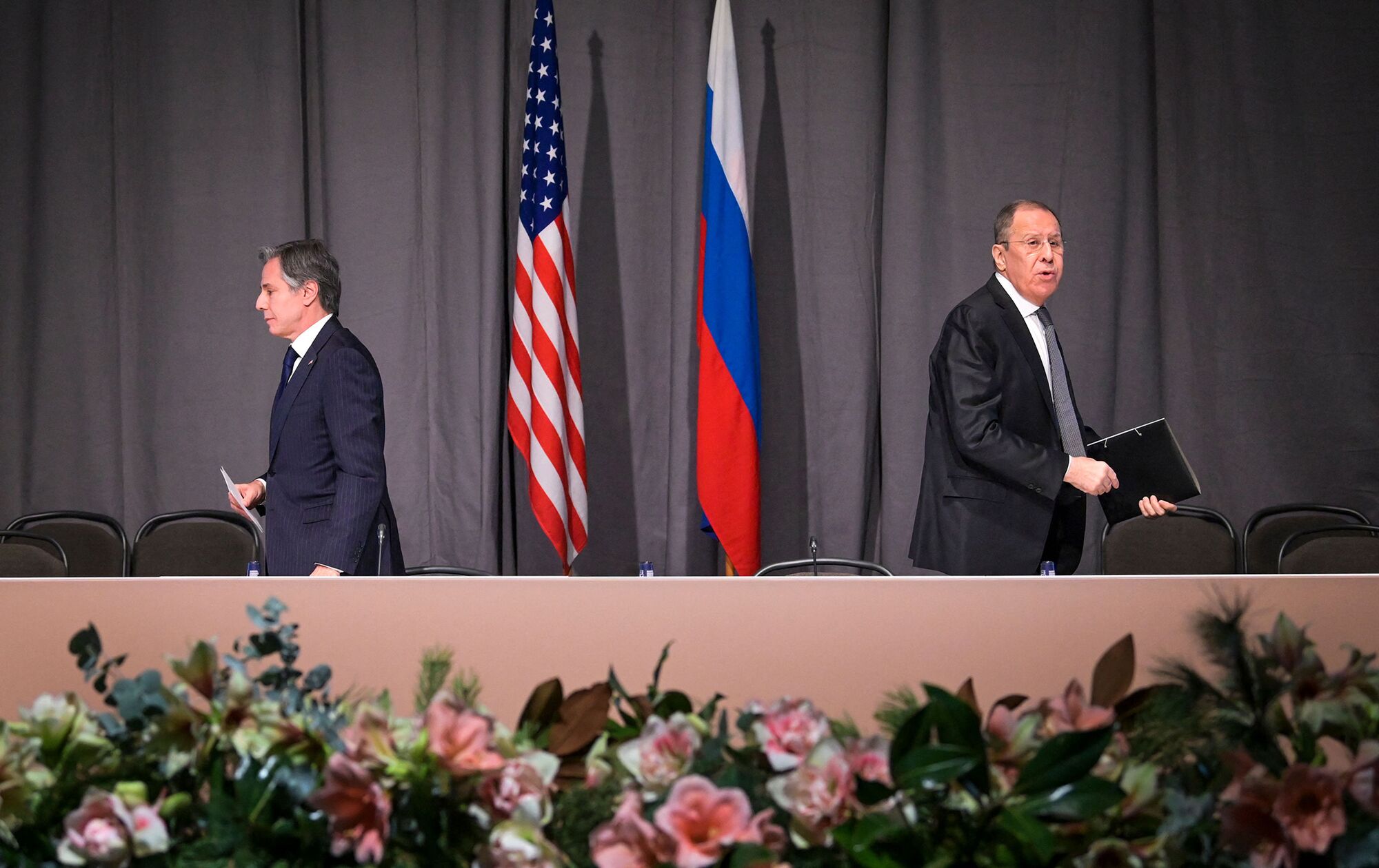 Antony Blinken, left, and Sergei Lavrov depart after a meeting in Stockholm, Sweden, on Dec. 2.
