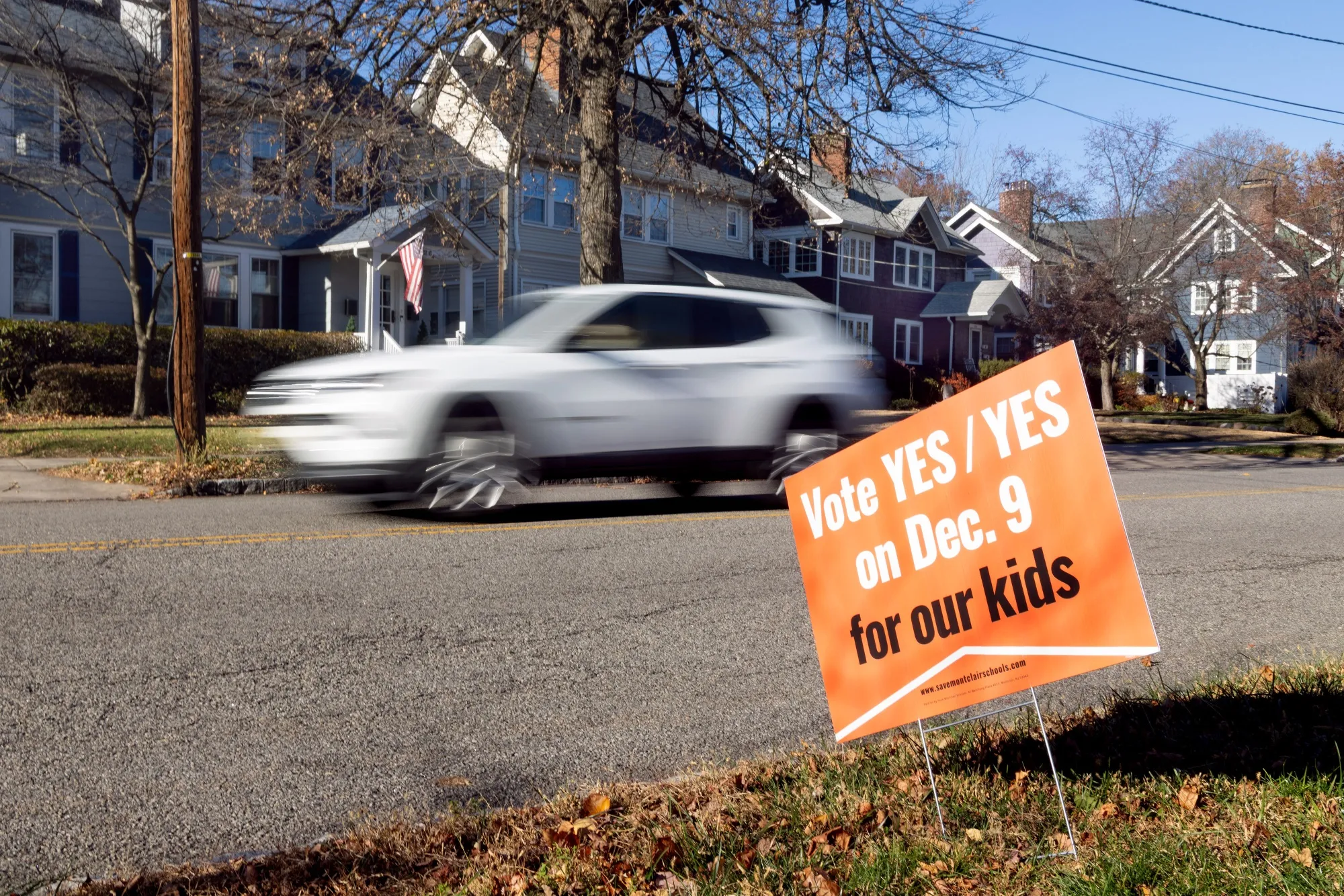 A sign encouraging residents to vote yes to two referendum questions that were scheduled for a December 9th vote in Montclair, New Jersey. The vote has been rescheduled for March 10.