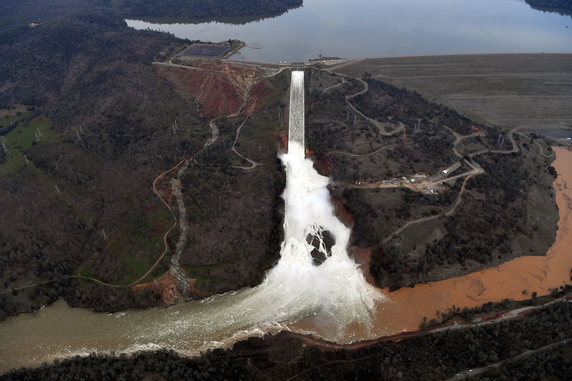 The Oroville Dam spillway releases 100,000 cubic feet of water per second down the main spillway in Oroville, California, on Feb. 13, 2017.

