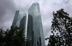 The twin tower skyscraper headquarter offices of Deutsche Bank AG stand in Frankfurt.

