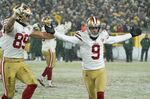 San Francisco 49ers' Robbie Gould celebrates after making the game-winning field goal against the Green Bay Packers.