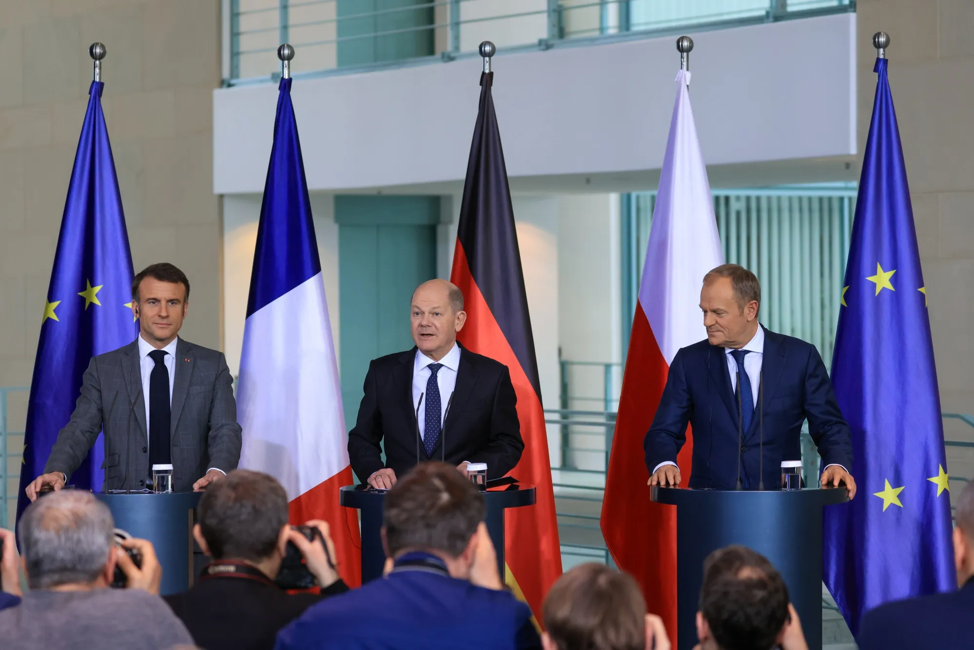 Emmanuel Macron, left, Olaf Scholz, and Donald Tusk, right, in Berlin on March 15.