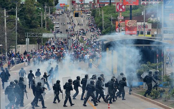 Honduras Unrest Spreads as Protesters Burn Tires at U.S. Embassy