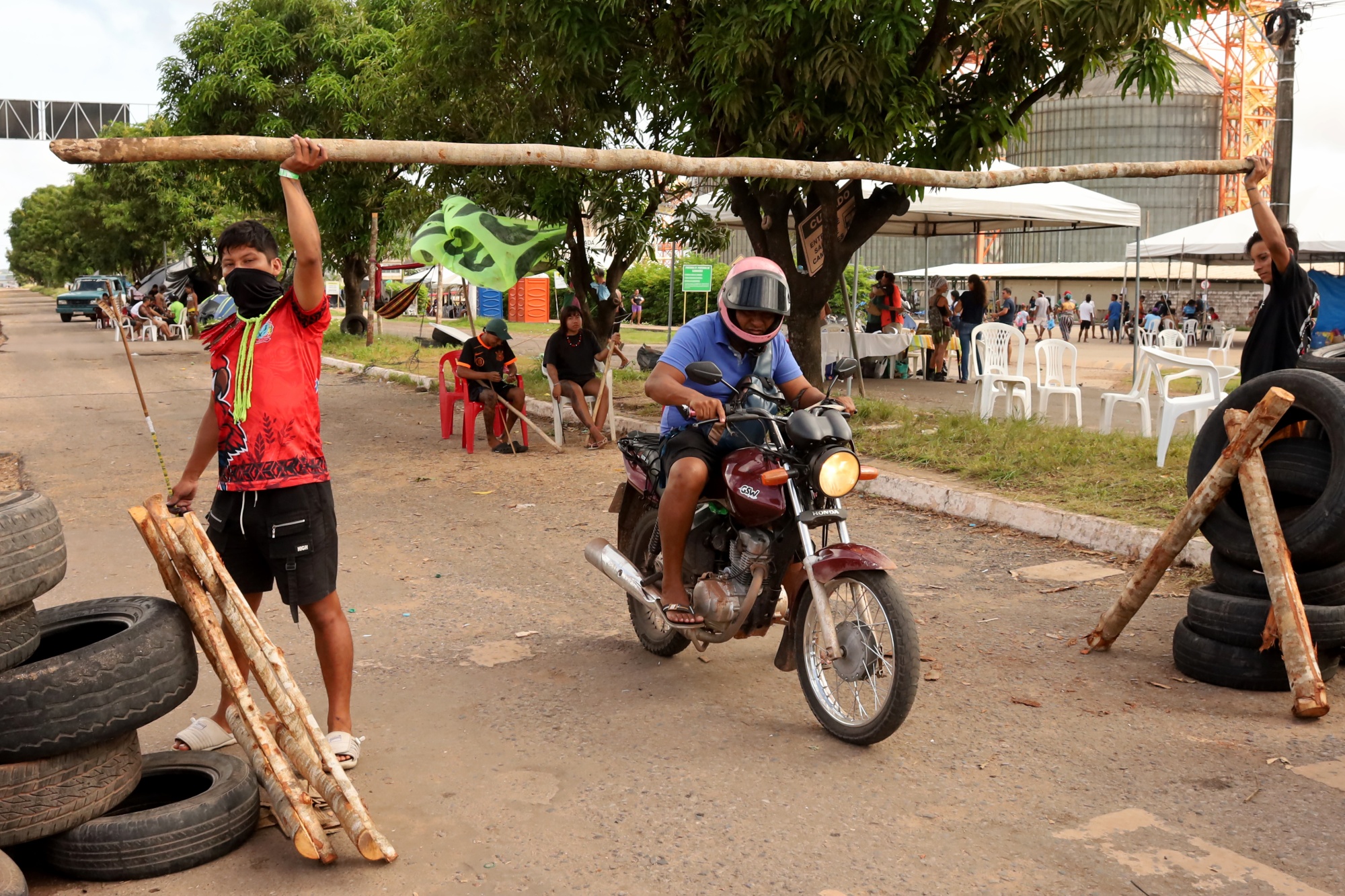 Indigenous protesters at a road block outside of the Cargill grain terminal, along the Tapajós and Amazon Rivers in Santarém, Pará state, Brazil, on Feb. 9. Photographer: Raimundo Pacco/Bloomberg