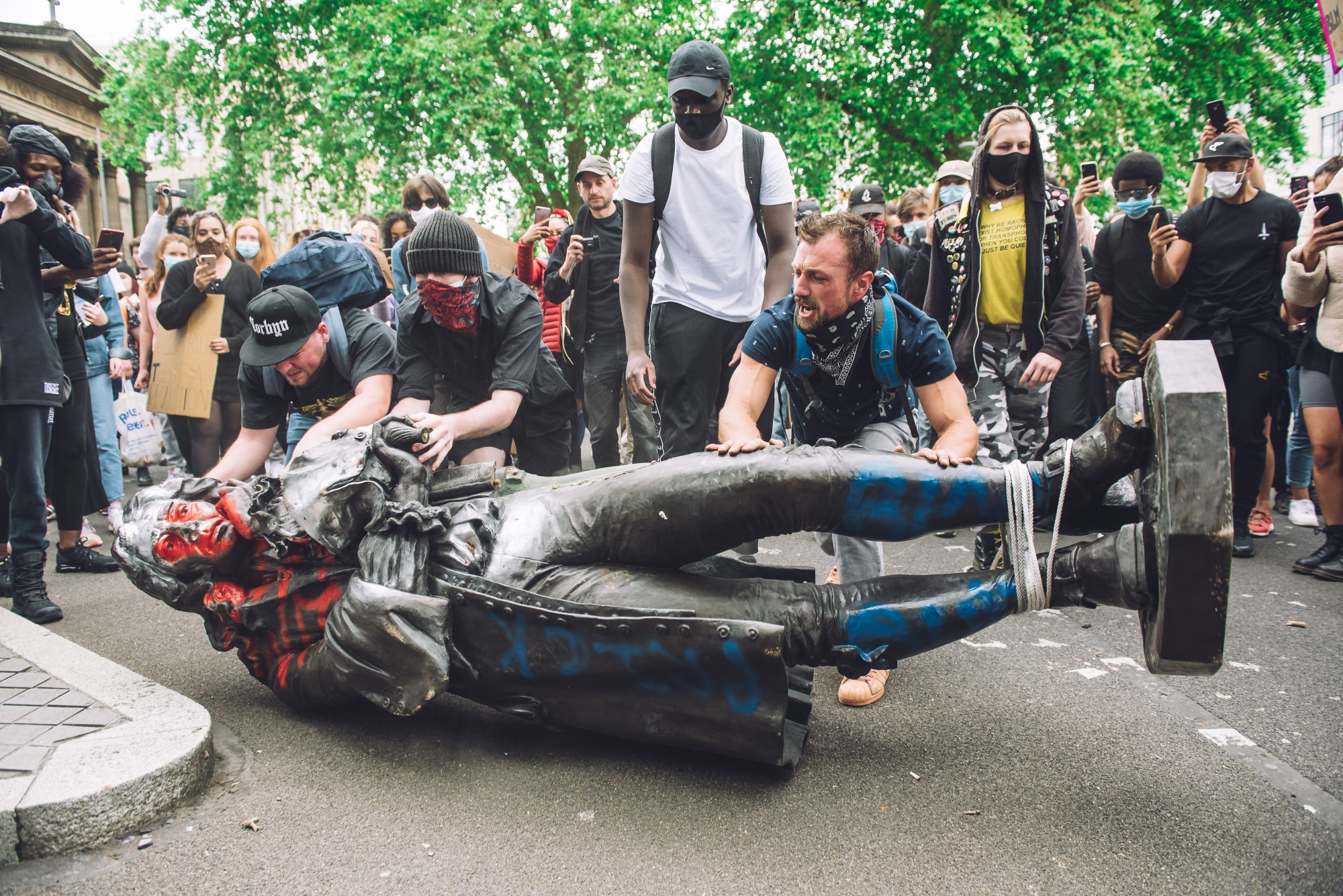 Anti Racism Protesters Rally Around World Topple Statue Bloomberg