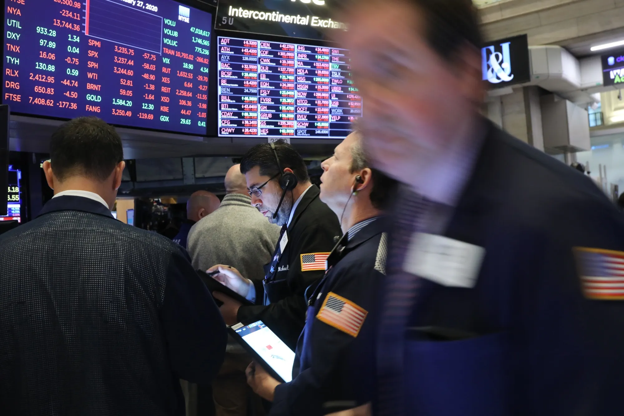 Traders work on the floor of the New York Stock Exchange on Jan. 27.