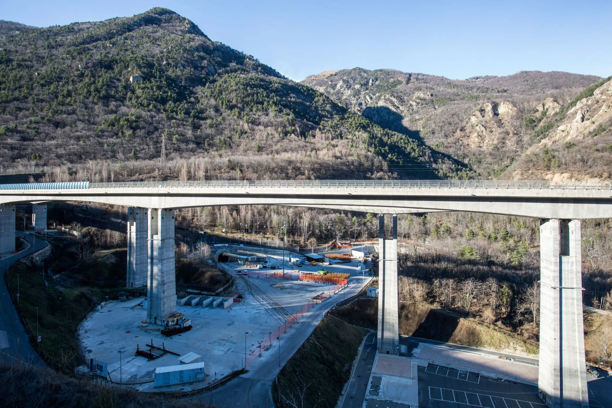 The entrance to the high-speed rail&nbsp;tunnel, known as TAV,&nbsp;through the Alps to France sits beneath a bridge in Val di Susa.