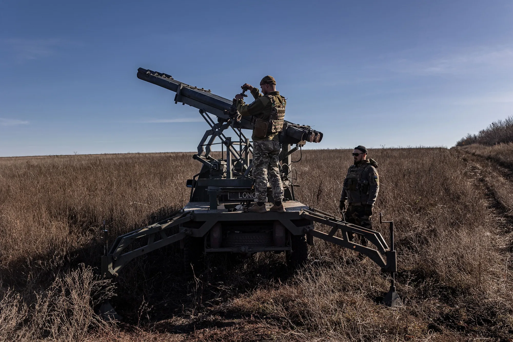 Ukrainian soldiers prepare a vehicle adapted for firing grad shells in the direction of Bakhmut, Donetsk Oblast, on Oct. 31.
