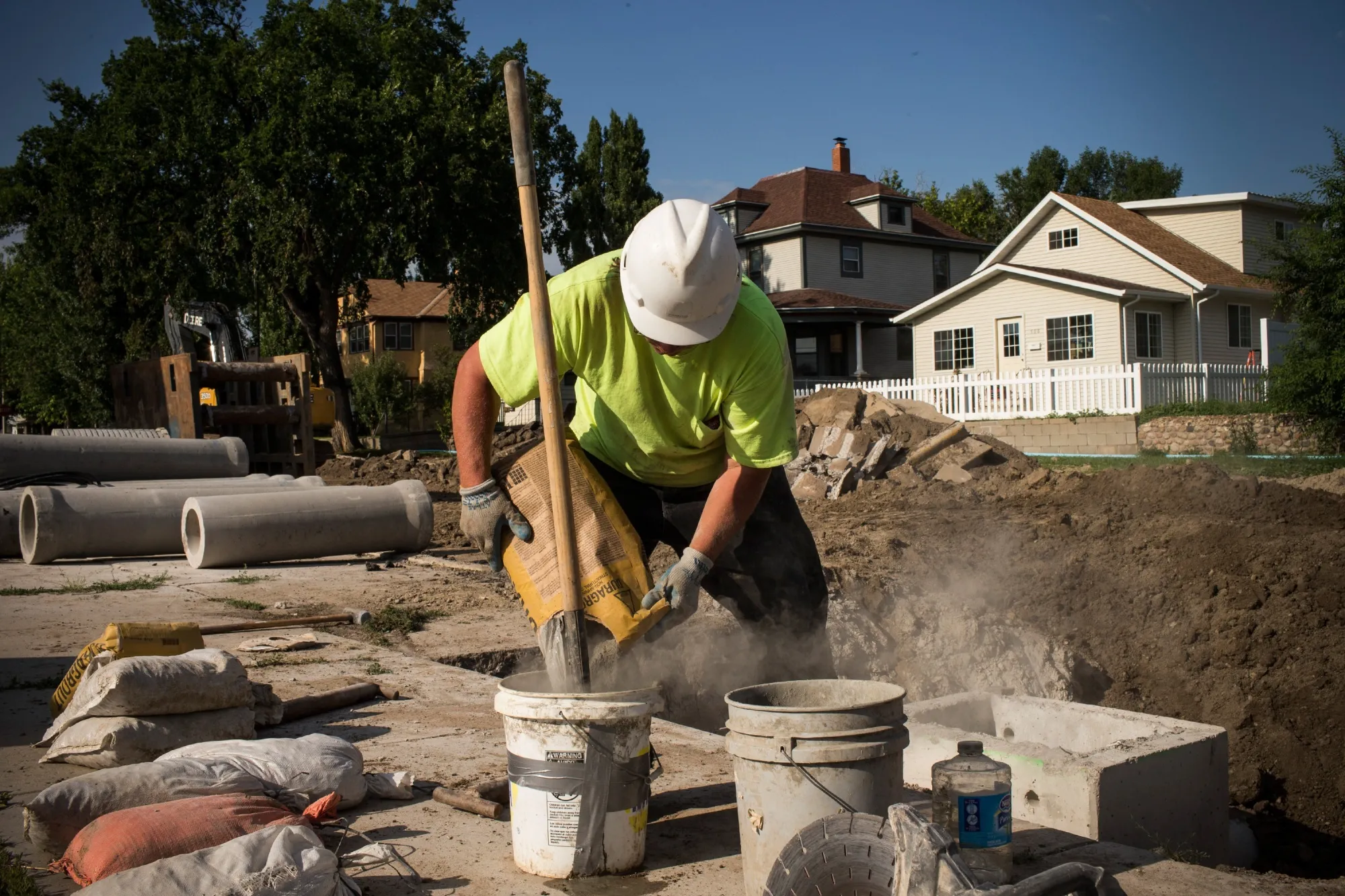 A&nbsp;construction worker mixes cement while replacing storm drains&nbsp;in Williston, North Dakota.&nbsp;