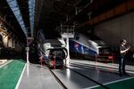 A pair of TGV high-speed railway train stand inside a hangar inside the Alstom SA factory in Belfort, France. 