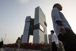 Pedestrians near the Tencent Holdings Ltd. headquarters in Shenzhen, China.