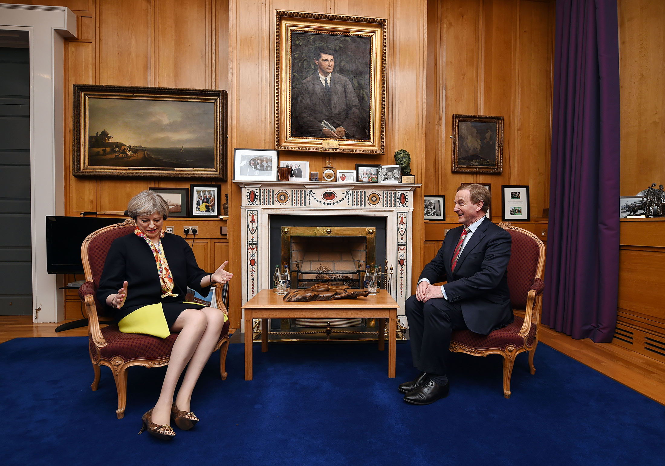British Prime Minister Theresa May and&nbsp;Irish Taoiseach Enda Kenny in his office in Dublin, where a portrait of the Irish revolutionary Michael Collins hangs.