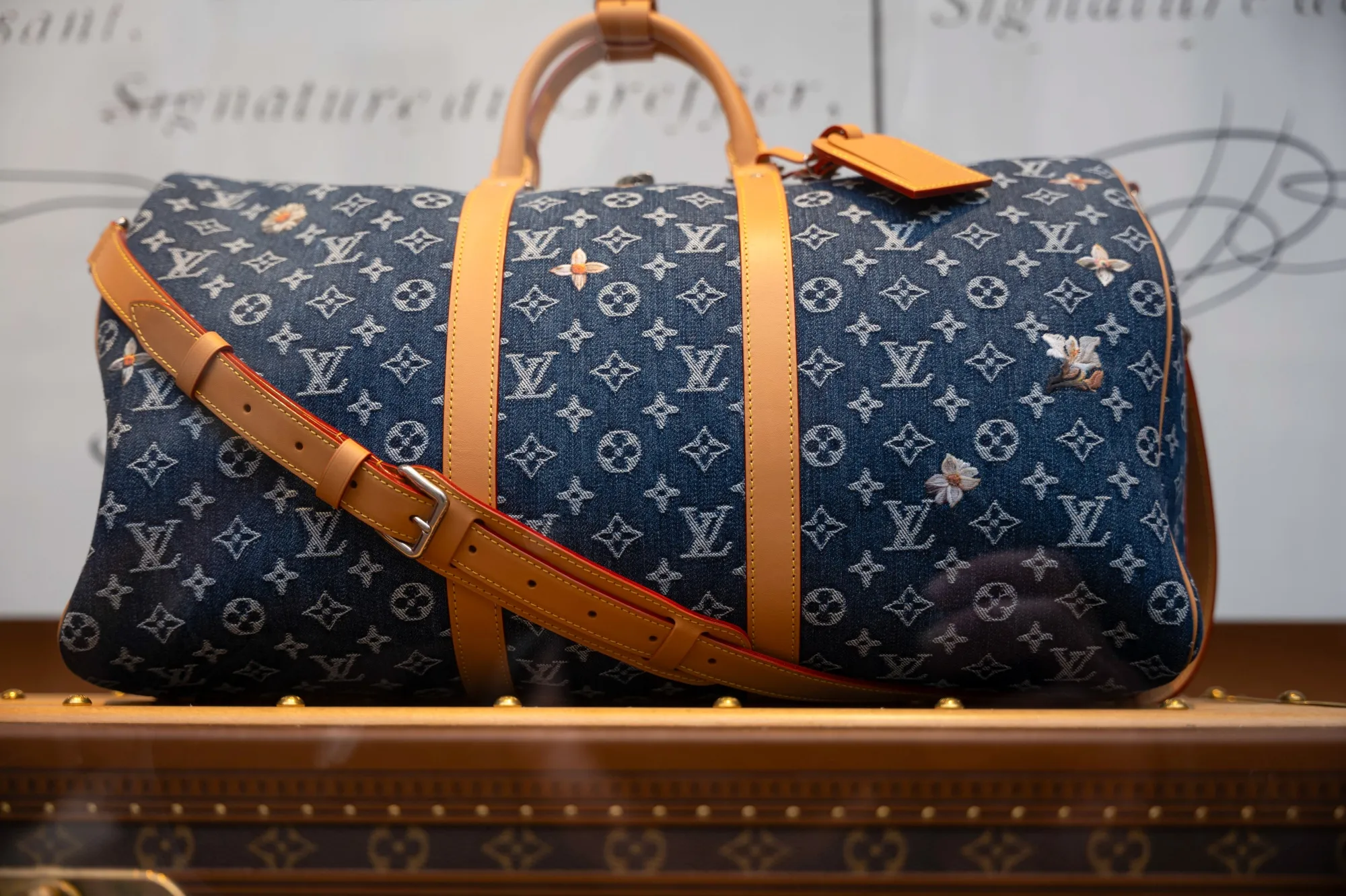 A bag in the window display at a Louis Vuitton boutique in London.