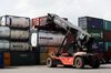 A reach stacker transports a fuel tank at the Uiwang Inland Container Depot (ICD) in Uiwang, South Korea, on Tuesday, May 8, 2018. South Korea is scheduled to release trade figures on May 15.