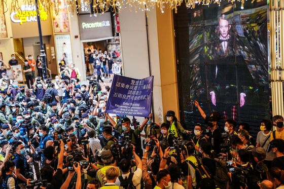 Hong Kong Ensures ‘Stable’ Holiday With Thousands of Riot Police