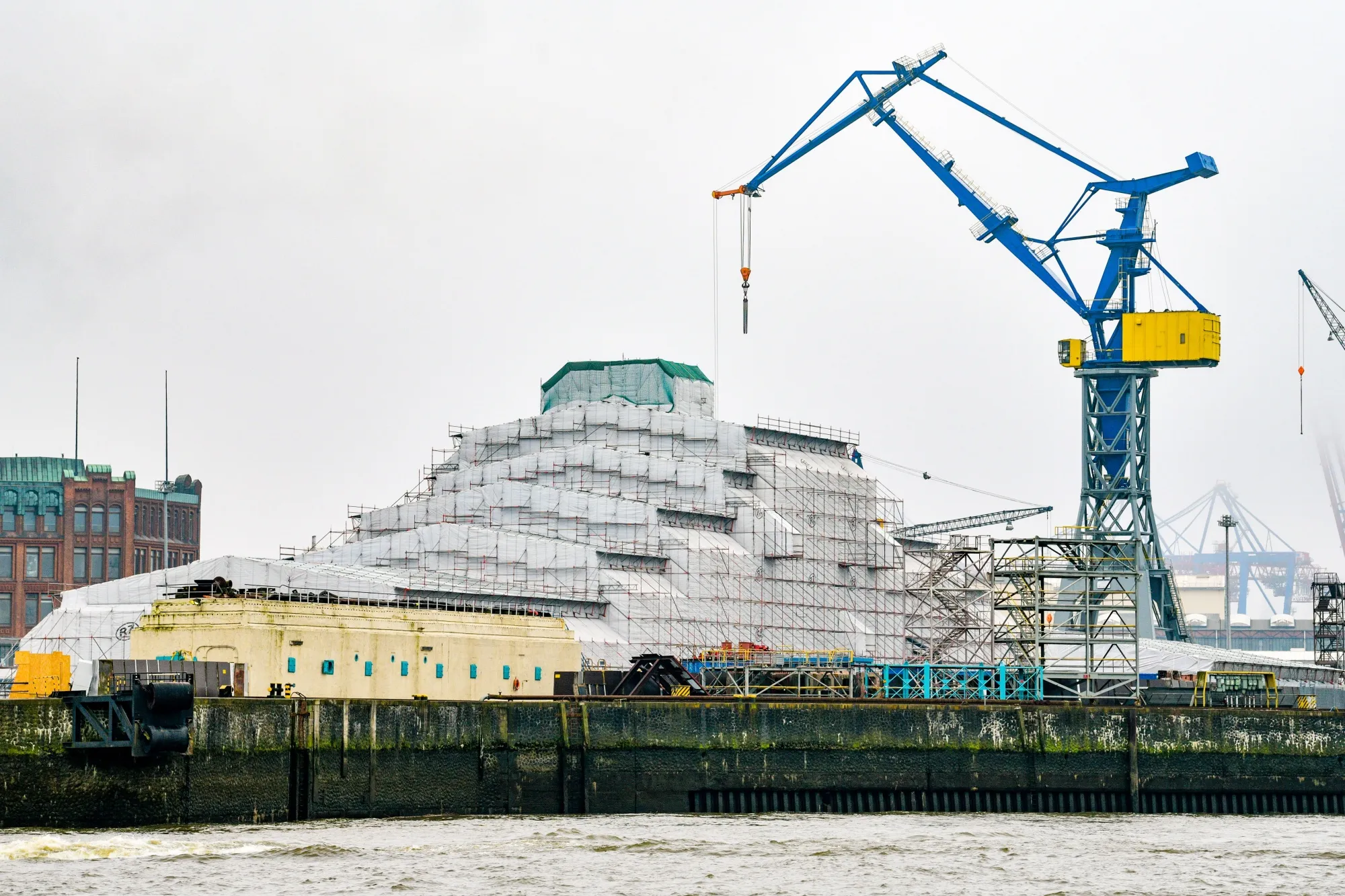 The Dilbar superyacht under cover while undergoing refitting at the Blohm & Voss dock in Hamburg, Germany, on March 4.