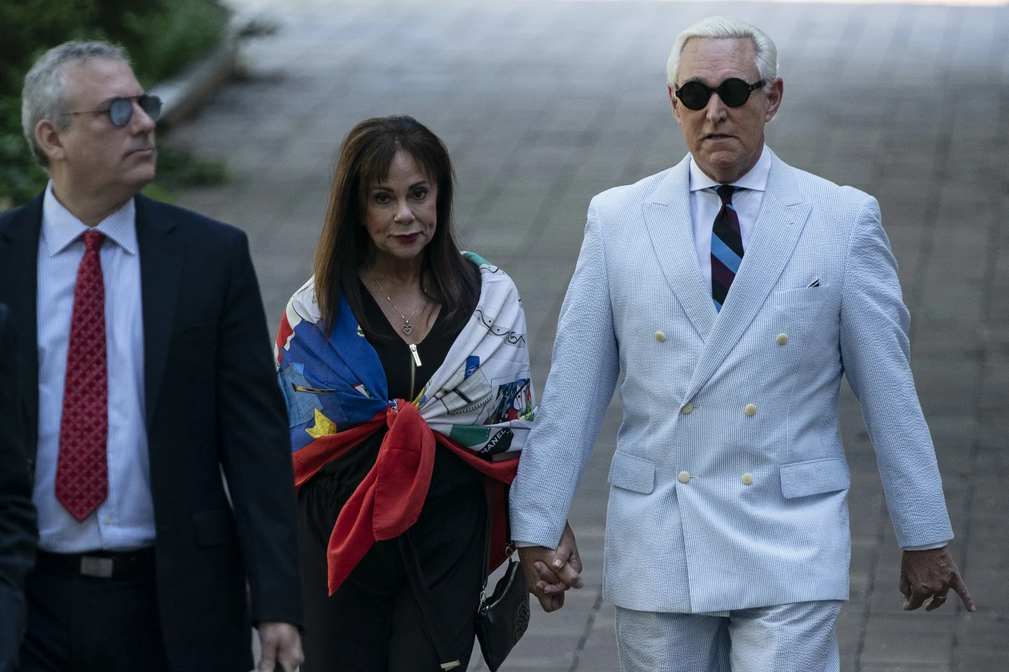 Roger Stone,&nbsp;right, and his wife Nydia Stone arrive at federal court in Washington, on&nbsp;July 16.&nbsp;