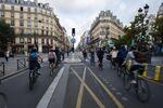 Cyclists use a bike lane on a section of Rue de Rivoli that had been converted to accommodate bike and bus traffic only. Paris is significantly&nbsp;expanding its network of segregated lanes, and shifting some of them from temporary to permanent.&nbsp;
