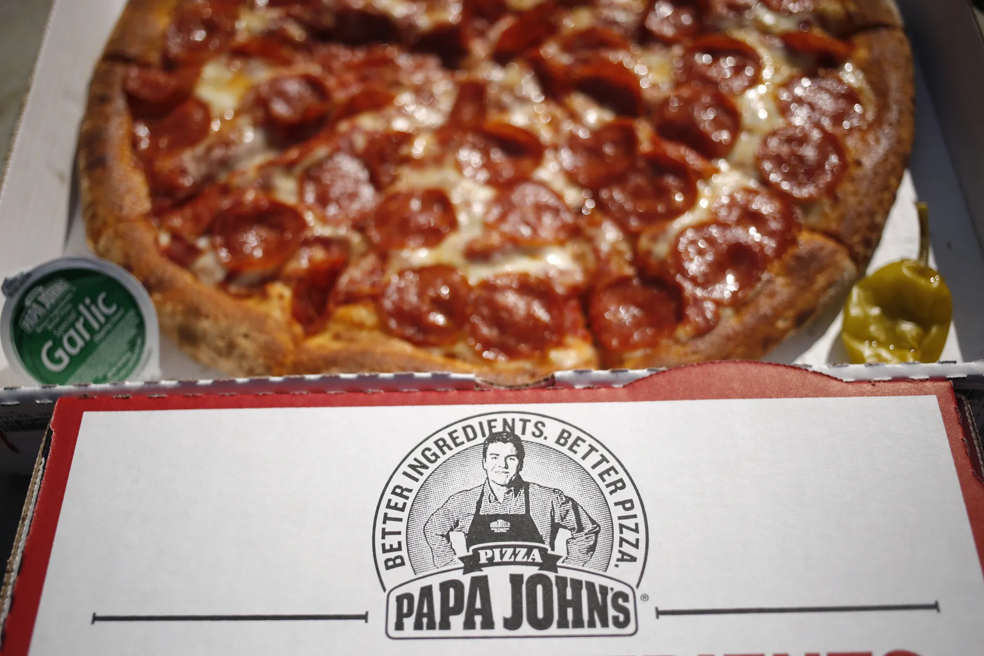 A logo in the likeness of John Schnatter, founder of Papa John's International Inc.
