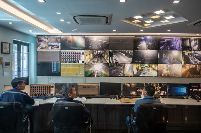 The group of trainers from Kushiro Coal Mine Co. talk with Vietnamese workers at the control center of Ha Lam Coal Mine in Cam Pha, Quang Ninh Province, Vietnam, on Tuesday, July 11, 2023. Photographer: Linh Pham/Bloomberg