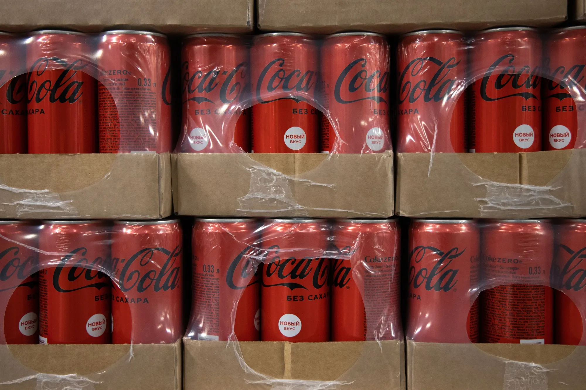 Boxes of Coca-Cola cans inside an Utkonos fulfillment center in Moscow.